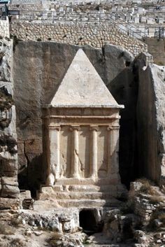 an ancient building in the middle of some ruins