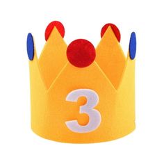 a yellow crown with the number three on it