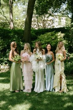 Mix Match Satin Bridesmaid Dresses, Bridesmaids Dresses Spring Colors, Bridesmaids Garden Wedding, Garden Wedding Aesthetic Bridesmaids, Bridesmaid Dresses For Summer Wedding, Wildflower Theme Bridesmaid Dresses, Lake Wedding Bridesmaid Dresses, Blue Green Yellow Bridesmaid Dresses, Colorful Spring Wedding Bridesmaids