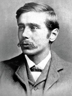 an old black and white photo of a man with a mustache