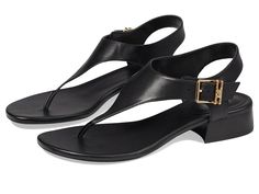 MICHAEL Michael Kors Robyn Flex Thong - Women's Sandals : Black : Embrace subtleness with a dash of style wearing the MICHAEL Michael Kors Robyn Flex Thong Sandals. The round toe flexible footwear features PVC upper construction with buckled ankle strap closure and low-block heels. Faux leather lining and lightly padded synthetic insole. Rubber outsole. Imported. Measurements: Heel Height: 1 1 4 in Weight: 7.3017 oz Product measurements were taken using size 7, width M. Please note that measurements may vary by size. Sleek Sandals With Buckle Closure And Round Toe, Chic T-strap Sandals With Buckle And Single Toe Strap, Sleek Round Toe Sandals For Work, Sleek Low Heel Sandals For Workwear, Chic T-strap Sandals With Low Heel And Removable Insole, Chic T-strap Sandals With Buckle Closure And Round Toe, Michael Kors Casual Leather Sandals, Chic T-strap Sandals With Buckle Closure, Luxury Michael Kors Leather Sandals