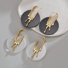 Gold Metal Liquid Drop Earrings/Abstract Statement Mismatched Earrings/Asymmetrical Melting Studs for Women/Minimalist Jewelry/Gift for her Looking for a gift that speaks volumes?  Elevate your style with these eye-catching Mismatched Melting Earrings. Crafted from 18K Gold Stainless Steel, these Asymmetrical Metal Liquid Drop Stud Earrings are the perfect blend of edgy and elegant. Make a bold statement with these Abstract Statement Studs/Mismatched Earrings that exude a modern and chic vibe. S Modern Party Earrings With Plating, Modern Circular Earrings For Party, Minimalist Circle Earrings For Party, Earrings Asymmetrical, Memory Design, Avant Garde Jewelry, Edgy Earrings, Mismatched Earrings, Traditional Jewelry