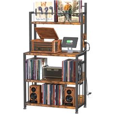 a book shelf filled with lots of different types of books and audio equipment on top of each other