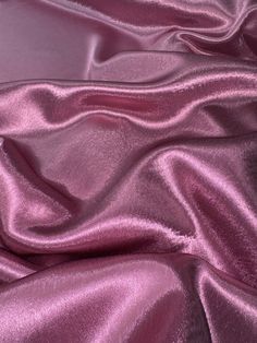 Dusty pink crepe back satin This high-quality satin fabric is a perfect choice for any project that requires a touch of elegance and sophistication. The 58-inch width make it suitable for a wide range of applications, from apparel to home decor and crafts. The fabric comes in a beautiful shade of silver, which adds a classy and luxurious feel to any design. Ideal for use in bridal dresses, blazers, curtains, and even marquees, this shiny crepe back satin fabric offers excellent drape and durability. Whether you are a professional designer or a DIY enthusiast, this fabric is sure to inspire your creativity and help you create stunning and unique creations. Get your hands on this gorgeous fabric today and let your imagination run wild! Delivery All items are dispatched within 1-2 working day Crushed Velvet Fabric, Deco Dress, Pink Lavender, Metallic Pink, Powder Pink, Gorgeous Fabrics, Crushed Velvet, Dusty Pink