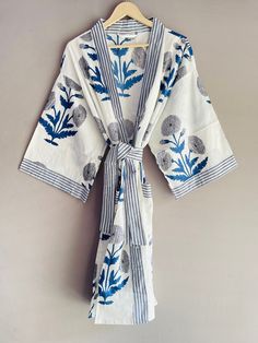 These Cotton Floral Print Robes are luxurious and sweet, and will make you and your bridesmaids feel like you're blossoming flowers ! These robes are perfect for bridesmaids gifts, birthday gifts, and perfect gifts for girls who are in college. A beautiful lightweight cotton kimono-style hand-printed dressing gown. The gown is 100 cms length  / bust approx. 120 cms. Features two front pockets, belt and loops. This soft cotton fabric is from India. Fabric has soft touch. * Measurements Approx : S Cotton Sleepwear With Kimono Sleeves, Cotton Sleepwear With Kimono Sleeves For Loungewear, Cotton Sleepwear With Kimono Sleeves For Home, Cotton Kimono With Kimono Sleeves For Loungewear, White Sleepwear With Kimono Sleeves For Loungewear, Cotton Sleep Kimono With Kimono Sleeves, Cotton Kimono With Kimono Sleeves For Sleep, White Kimono Sleeve Sleepwear For Home, Summer Cotton Sleep Kimono