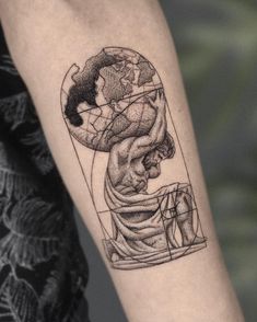 a tattoo on the arm of a person with a globe in his head and hands