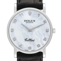 Rolex Cellini Classic White Gold Mother of Pearl Dial Mens Watch 5115. Manual winding movement. 18K white gold slim case 32 mm in diameter. Case thickness: 5.5 mm. Rolex logo on the crown. . Scratch resistant sapphire crystal. Flat profile. Textured mother of pearl dial with raised gold Arabic numerals. Black leather strap with Rolex 18k white gold tang buckle. Designer White Watch Accessories For Formal Occasions, Luxury White Watch Accessories For Anniversary, Modern Platinum Watches In White Gold, White Watches With Polished Finish For Anniversary, Modern Platinum White Gold Watches, Luxury White Anniversary Watches, Modern White Diamond Watch For Formal Occasions, White Polished Business Watches, Luxury White Watch For Formal Occasions