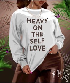 a woman wearing a sweatshirt that says heavy on the self love