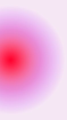 an image of a red and white circle with some blurry lines on it's surface