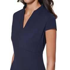 Ideal for your career collection, Calvin Klein's sophisticated sheath dress effortlessly layers under a blazer for a work-perfect outfit..Approx. 40-1/2' long from center back neck to hem. Length is based on size 6 and varies 1/4' between sizes..Sheath: Tailored fit through the chest, waist and hips; sits close to the body.Scuba Crepe: Stretchy and supportive.V-neck; Sheath silhouette.Back zipper closure.Cap sleeves.Lined.Polyester, spandex; lining: polyester.Dry clean.Imported Hunter Green Calvin Klein Dress, Review Dresses, Calvin Klein Woman, Women Trends, Caps For Women, Clothing Dresses, Cap Sleeve, Perfect Outfit, Classic Looks