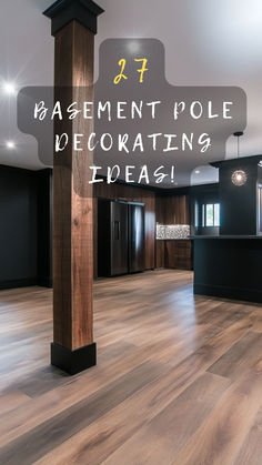 an empty room with wood flooring and black walls that says basement pole decorating ideas