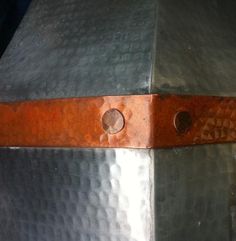 a piece of metal that has some holes in it