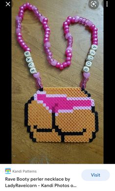 a beaded necklace with pink sunglasses on it