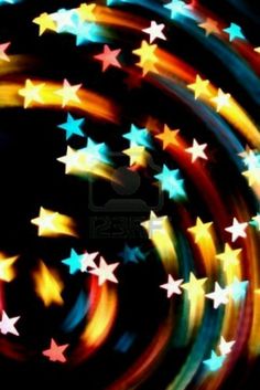 colorful stars are arranged in the shape of a circle