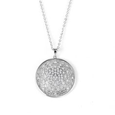 Embrace the essence of life and unity with our flower of life filigree style circle pendant in rhodium over sterling silver, a piece that resonates with deep symbolism. The centerpiece of this pendant is the flower of life design, intricately crafted in a filigree style, representing the cycle of life, this design is rich with symbolism and adds a touch of elegance to any outfit. The pendant is adorned with 60 brilliant 1.25mm round moissanite stones, creating a radiant sparkle that complements Spiritual Silver Cubic Zirconia Necklace, Silver Spiritual Necklace With Cubic Zirconia, Spiritual Silver Necklace With Cubic Zirconia, Elegant Sterling Silver Round Disc Necklace, Elegant Silver Round Disc Necklace, Silver Circle-shaped Cubic Zirconia Jewelry, Silver Cubic Zirconia Circle Jewelry, Silver Cubic Zirconia Jewelry, Silver Sterling Medallion Necklace With Round Pendant