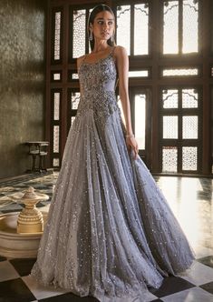 Grey shimmer pearl tulle gown with stone and cut-dana embroidery. Olive Gown, Pearl Gown, Dolly J, Drape Sarees, Detachable Cape, Gown Designs, Grey Gown, Set Saree, Saree Gown