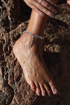 This statement anklet will look just as cool with a glamorous dress and high heels, as with sneakers or flat sandals and a sporty outfit. Wear it from day to night and combine with our Noha bracelet and choker for a total look!  Handcrafted from the highest quality 925 silver and is available in pure silver or gold plated with a thick layer of 24 carat gold. It features a dangling Jungle Dream snake - one of the oldest and most widespread mythological symbols. Throughout centuries it has been as Summer Party Anklet With Chain Detail, Mythological Symbols, Dream Snake, Leg Jewelry, Glamorous Dress, Robes Glamour, Sporty Outfit, Silver Anklet, Ankle Jewelry