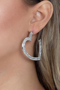 Two rows of blinding white rhinestones are encrusted along the front of a heart shaped silver hoop, creating a heart-stopping sparkle. Hoop measures approximately 2" in diameter. Earring attaches to a standard post fitting.   Sold as one pair of hoop earrings. White Hoop Earrings, Heart Hoop Earrings, Heart Shaped Earrings, Paparazzi Accessories, Rhinestone Heart, White Rhinestone, Silver Bars, Paparazzi Jewelry, White Earrings