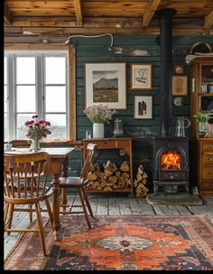 a living room filled with furniture and a fire place next to a wooden stove top oven