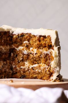 a slice of carrot cake with cream cheese frosting