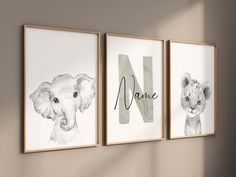 three framed pictures with animals on the wall