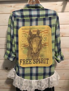 womens one of a kind re-purposed light weight  plaid shirt, repurposed tee shirt graphic on the back, 3 inch eyelet lace at the bottom hem, Casual Upcycled Tops For Spring, Free-spirited Cotton Tops For Fall, Fall Cotton Free-spirited Tops, Casual Distressed Plaid Tops, Vintage Plaid Spring Tops, Vintage Plaid Tops With Snap Buttons, Vintage Plaid Flannel Shirt, Vintage Plaid Tops With Button Closure, Womens Blouses