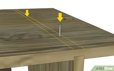 a wooden table with two screws on it and three yellow arrows pointing to the top