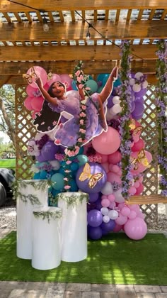 balloons and decorations are displayed on the lawn