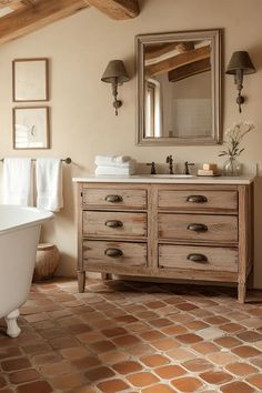 a bath room with a tub and a mirror