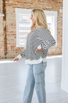 Experience ultimate comfort and style with our Pierce Striped Loose Sweatshirt! Made with soft and breathable fabric, this sweatshirt features a trendy striped design that will elevate any casual look. Embrace effortless fashion and cozy vibes with our Pierce Striped Loose Sweatshirt. Model Info: Models are 5'7", Size 2, wearing smalls Material: 95% Cotton + 5% Elastane Sizes Bust Hem_Width Sleeve_Length Length Relax Relax Relax Relax S 44.9 41.3 27.7 26.8 M 47.2 43.7 28.3 27.6 L 49.6 46.1 29.0 White Tops With Contrast Stripes For Layering, Casual Tops With Striped Cuffs For Fall, Casual Black Tops With Striped Cuffs, Sporty Striped Top With Ribbed Cuffs, Trendy Crew Neck Sweater With Contrast Stripes, White Long Sleeve Sweater With Striped Hem, Casual Tops With Striped Cuffs And Relaxed Fit, White Casual Sweatshirt With Contrast Stripes, Casual White Sweatshirt With Contrast Stripes