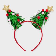 The Girls' Tinsel Christmas Tree Headband by Cat & Jack™ is the perfect accessory for spreading holiday cheer. Featuring mini Christmas trees with vibrant tinsels, this headband adds sparkle to any holiday outfit. Made from lightweight, comfortable material, it’s ideal for Christmas parties, school celebrations or family gatherings. Cat & Jack™ - Designed for all children so you can trust it's made for yours. Novelty Christmas Party Headband, Adjustable Headband For Holiday Festivities, Christmas Party Adjustable Hair Accessories, Adjustable Christmas Holiday Headband, Christmas Hairband, Tree Headband, Christmas Tree Headband, Makeup Hairband, Tinsel Christmas Tree