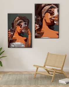 two framed art prints on the wall of a living room