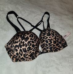 This Is Victoria Secret Push Up Bikini. Brand New With Tags! Size 32d Leopard Print Black And Tan With Shine Straps That Glisten In The Sun. Adjustable Straps And Waist. I Ship As Soon As I See A Purchase! Leopard Print Stretch Underwire Bra, Stretch Underwire Bra In Leopard Print, Pink Swimwear, Pink Swim, 2 Piece Swimsuits, Womens Bathing Suits, Victoria Secret Swim, Black Tan, Bra Tops