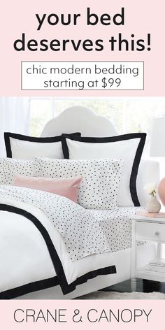 a bed with black and white polka dots on it