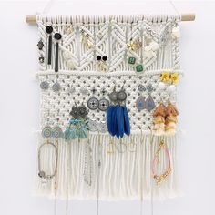 PRICES MAY VARY. Elegant Wall Decoration: Add a touch of boho style to your space with the macrame jewelry holder. This beautiful jewelry wall organizer is designed to store and showcase your earrings and necklaces, and can be mounted on a door, wall or closet. (Jewelry NOT included) Durable & Efficient: Made from 4 mm natural cotton, this earring hanger boasts a sturdy construction. The mesh design ensures that the opening is perfectly sized to hold earring hooks and posts securely in place, pr Macrame Earring Holder, Hanging Necklace Organizer, Closet Storage Accessories, Jewlery Holder, Closet Wall, Earring Hanger, Driftwood Jewelry, Diy Jewelry Display, Jewelry Organizer Wall