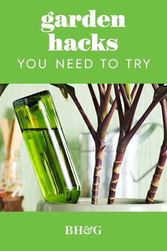 there is a green bottle with some plants in it and the words garden hacks you need to try