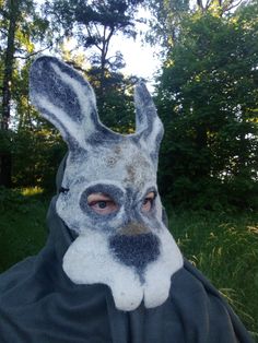 An original hare mask with long ears and teeth for lovers of transformation and fun. Unisex hare mask. The ears are 17-20 cm long. The mask is made of Latvian wool and merino wool with the addition of viscose and linen fibers on gauze. The mask is made using a flat template, after which it is given a three-dimensional shape. The mask is made by wet felting from wool with water and soap. On the mask I drew the face and ears of a hare using wool and fibers. At the end of the work, I gave the mask Hare Mask, Mask Theater, Bunny Mask, Animal Mask, Carnival Mask, Three Dimensional Shapes, Scary Mask, Halloween Mask, Cosplay Halloween