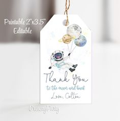 a thank you card with an astronaut on the moon and planets hanging from it's string