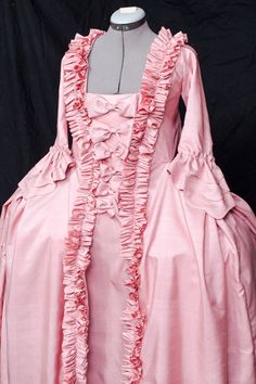 One of the most popular gowns of the 18th century. Here is the fabric tafetta, but If you wish it coud be done of cotton or silk (the fabric price for silk fabric has to be paid extra). The stomacher had to be pinned to the stays traditionally, here I have sewed the dress and the stomacher together. It can be undone if you wisch. The pockets can be reached through the hidden opening on the sides of the dress and petticoat. If this fabric is unavailable at the moment, i will offer you another one 18th Century French Fashion, Outlander Style, Rococo Dress, Fashion Timeline, 18th Century Dress, Womens Costumes, Pink Costume, Fashion Forms, Victorian Clothing