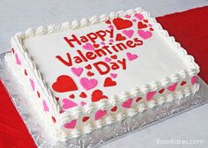 a valentine's day cake with hearts on it