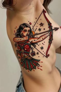 a woman with a bow and arrow tattoo on her chest