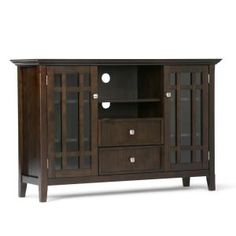 a wooden entertainment center with glass doors on the front and bottom shelves, in dark wood