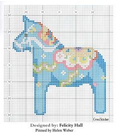 a cross stitch pattern of a blue horse with flowers on it's back and the words, designed by felicity hall