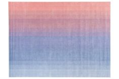 a blue and pink rug with horizontal stripes on the bottom, in shades of purple