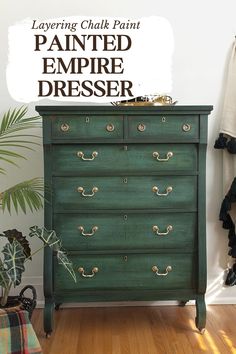 an old dresser painted green and gold with the text layering chalk paint painted empire dresser