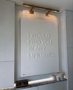 there is a white sign that says i would find you in any life time on the wall