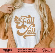 a woman wearing a fall y'all t - shirt with the words, it's fall y'all