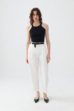 These pants boast a stylish and flattering design, crafted from high-quality fabric that withstands a busy lifestyle. Ideal from day to evening, they offer a regular fit, full fit, are unlined, and feature double dart detailing on both the front and back. Designed without pockets, these high-waisted pants come with a fly zipper and hook closure. Dry clean Material:72% Polyester, 22% Viscose, 6% Elastane High rise Officially licensed Imported Brand: Nocturne Model Product Size: S Model Size: Heig Elegant Tapered Leg Summer Bottoms, Elegant Tapered Leg Summer Pants, Modern Summer Business Casual Pants, Modern Business Casual Summer Pants, Busy Lifestyle, Pleated Pants, Nordstrom Store, Bottoms Pants, S Models