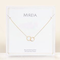 Circles often symbolize infinity. Interlocking circles are the perfect representation for two people united until the end of time. Show your natural affinity for mom, friend, sister, or lover by giving them this gorgeous necklace! This sweet & simple style is sure to please. Each necklace comes on a gorgeous matte gold jewelry card. Add our signature occasion bellyband to your sustainable, faux-suede lined jewelry box to customize your gift and make it extra special. read more about our packagin Elegant Infinity Necklace As Gift For Mom, Elegant Infinity Necklace For Mom, Elegant Nickel-free Necklace For Mom, Dainty Infinity Necklace As Gift For Her, Adjustable Minimalist Infinity Necklace, Elegant Hypoallergenic Necklace As Gift For Mom, Minimalist Adjustable Infinity Necklace, Elegant Adjustable Necklace For Mom, Elegant Hypoallergenic Necklace For Mom