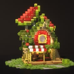 a house made out of legos on top of grass